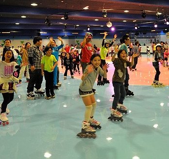 "Showing our skills at the roller rink!"